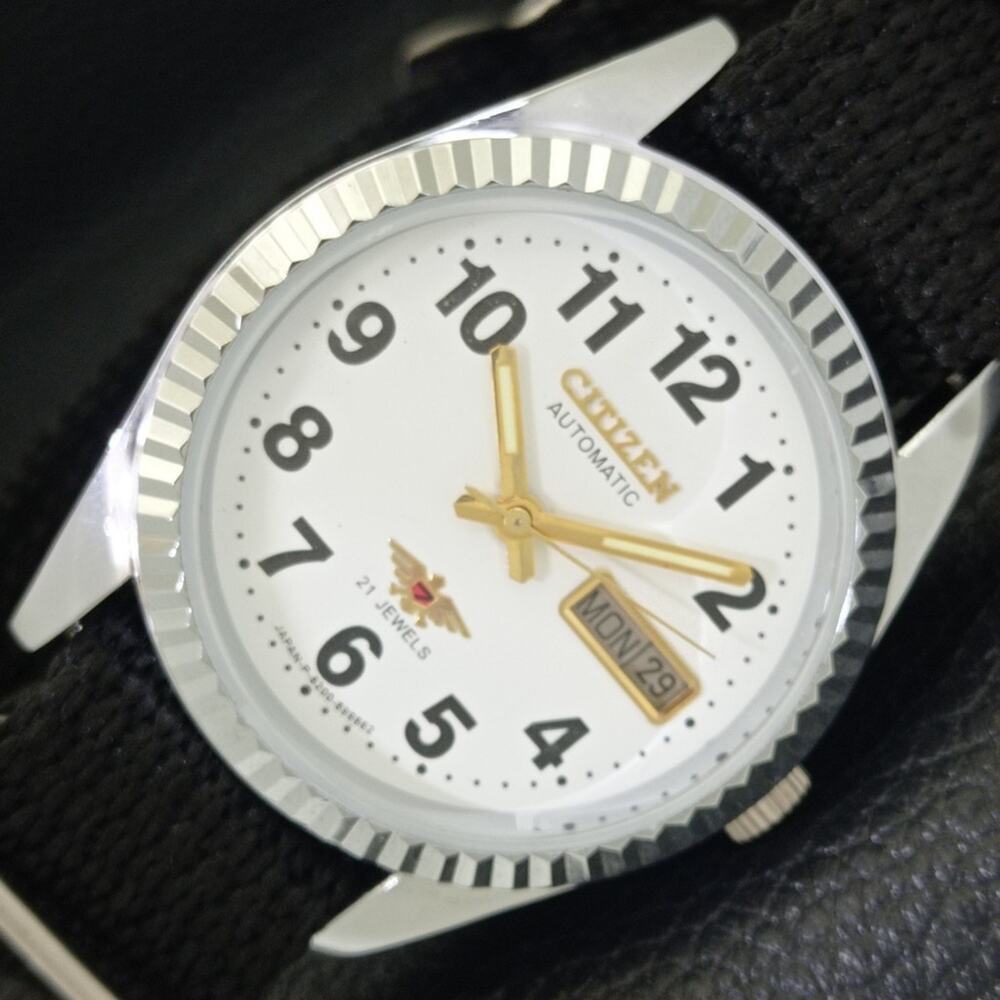 Citizen Men's Black and Gold Watch